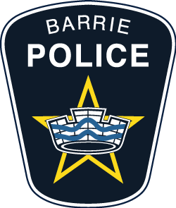 Barrie Police Service crest with the words Barrie Police, an image of a masonry crown representing civic authority. On the crown are two wavy blue lines alluding to Barrie’s location on the lake, these are set over five interlacing gold lines representing the five major provincial highways that intersect Barrie.